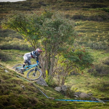Orange Team Rider on open trail