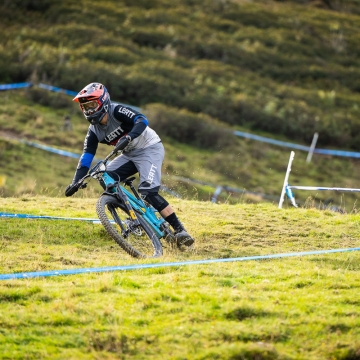 Orange Team Rider on open trail